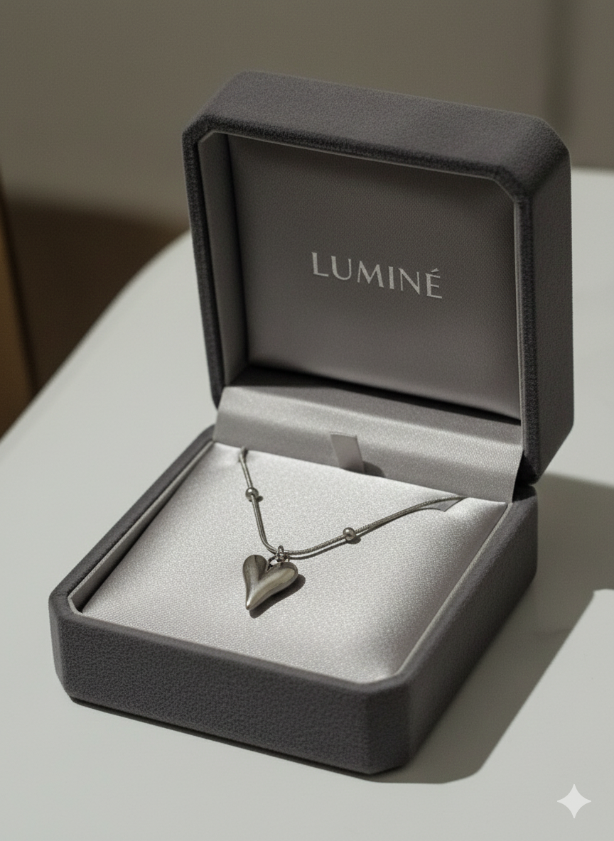 Rhodium Plated Puffy Heart Satellite Necklace